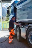 Renault Trucks C Cab 2.5 m in Switzerland next to Splügen - Driver filling up