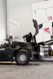 technician at work on a Renault Trucks T cabin lowered