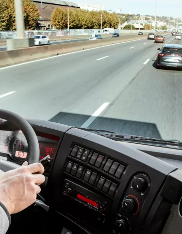 Renault Trucks D Cab 2.1 m driving on a road